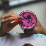 Enjoy a healthy and vibrant blueberry yogurt smoothie with a pop of color, perfect for a nutritious lifestyle.